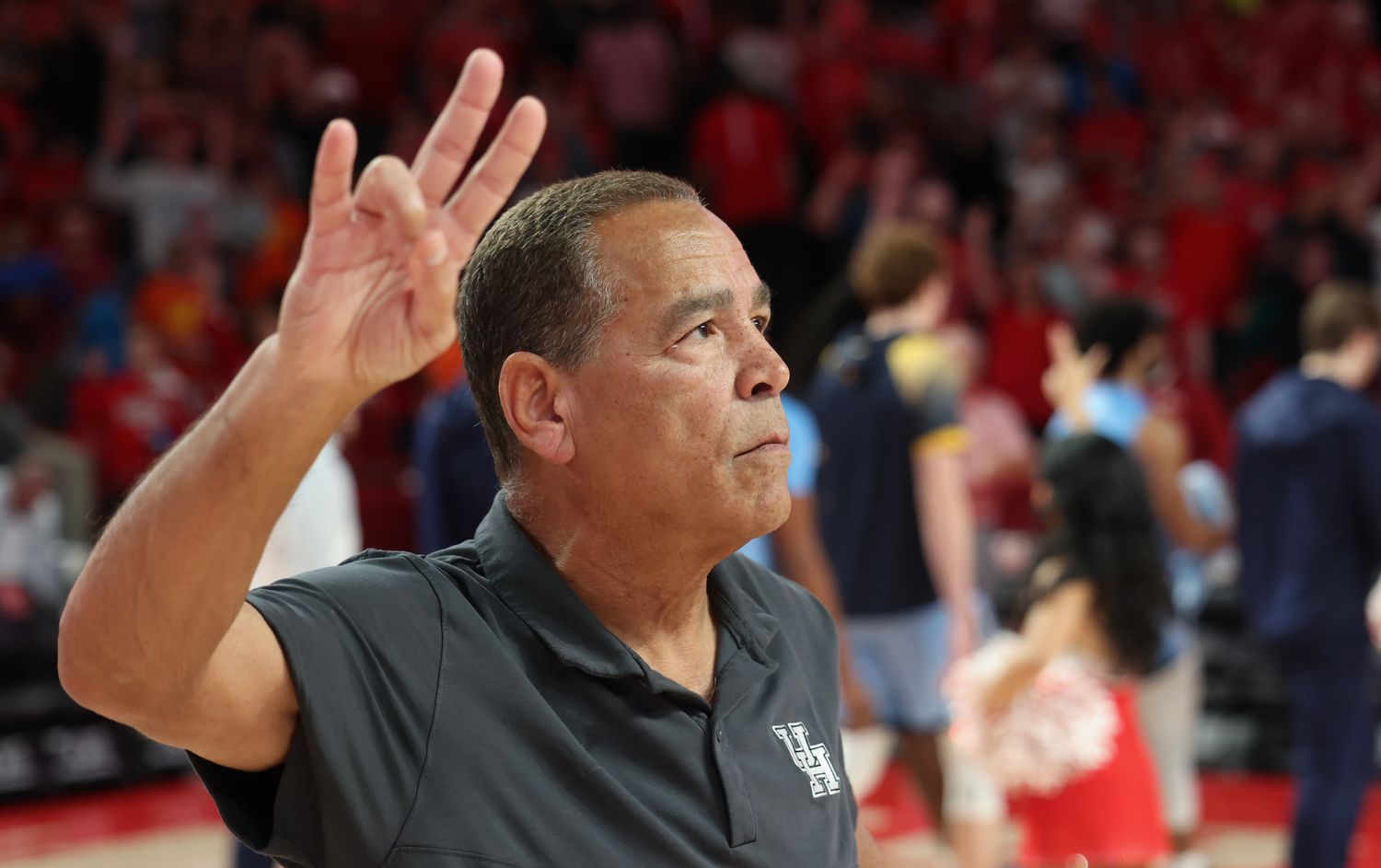 Nov 26, 2022; Houston, Texas, USA; Houston Cougars head coach Kelvin Sampson stands for the school song after defeating the Kent State Golden Flashes at the Fertitta Center. Mandatory Credit: Thomas Shea-USA TODAY Sports